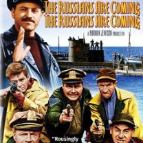 Movie poster of the Russians are coming with lots of guys coming off a ship like they are Russians menacing the US
