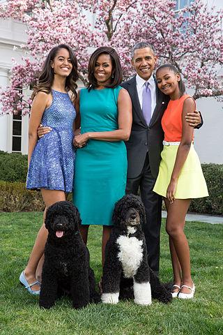The Obama family posing outside