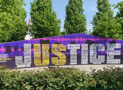 The word JUSTICE on a long wall
