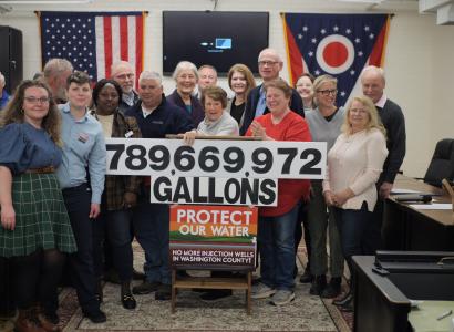 Protesters holding sign
