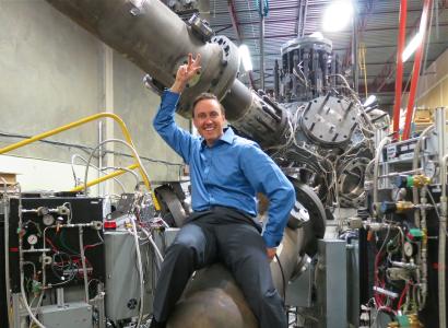Steam punk fusion man riding what looks like a bomb but is in laboratory 