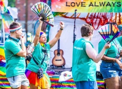 People marching in bright colors