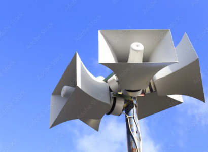 Speakers on a tall pole