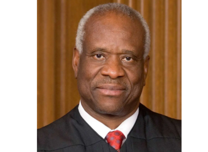 Black man in a Supreme Court robe
