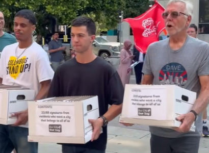 People carrying petition boxes