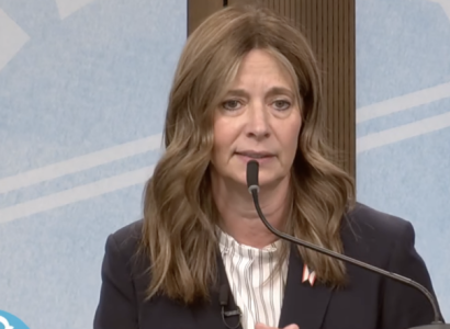 Amy Action at a podium