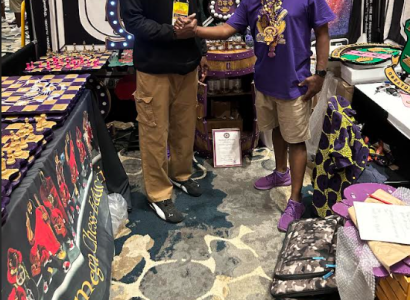 Two men shaking hands at an event