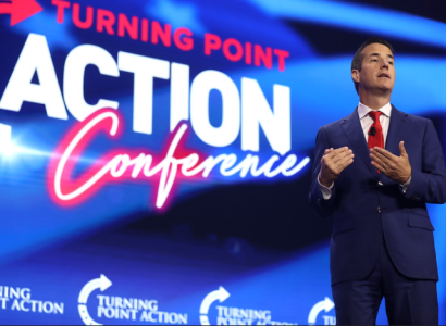 Moreno speaking on a stage