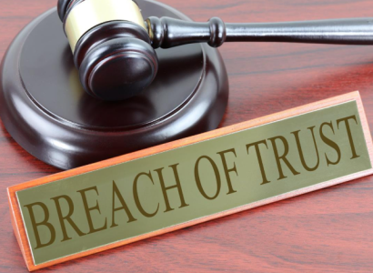 Gavel and words Breach of Trust