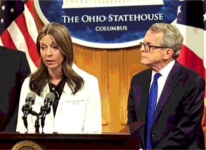 Amy Acton with Governor Dewine and Jon Husted
