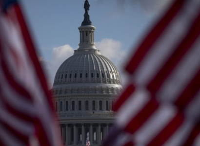 Building sourrounded by US flags