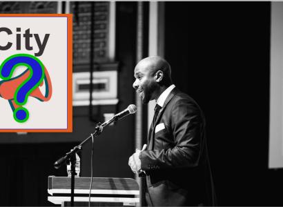 Black man at podium