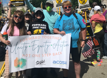 People holding a banner