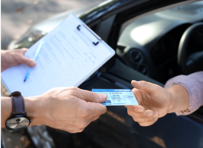 Handing a drivers license thorugh window