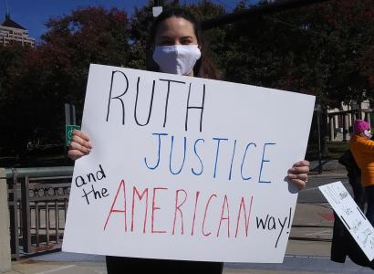 Sign saying Ruth Justice and the American Way