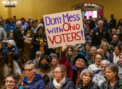 People protesting with sign saying Don't Mess with Ohio Voters