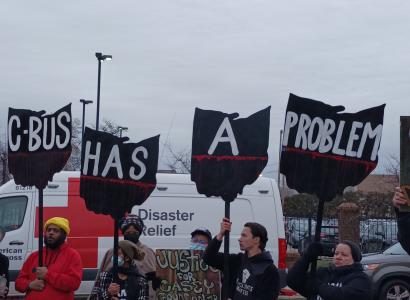 Protesters with signs