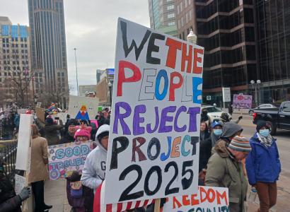 Sign saying We the People reject Project 2025