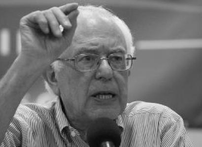 Black and white photo of Bernie Sanders gesturing as he talks