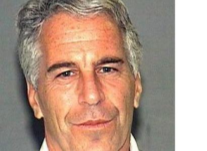 Middle-aged white man with gray hair and white shirt looking quizzical