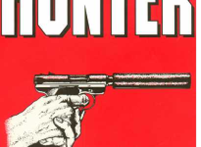 Red background, white words HUNTER at top and below a drawing of hands holding a sharpshooter type of gun
