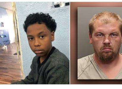 Young black child and white man