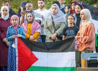Group of people with a Palestinian flag