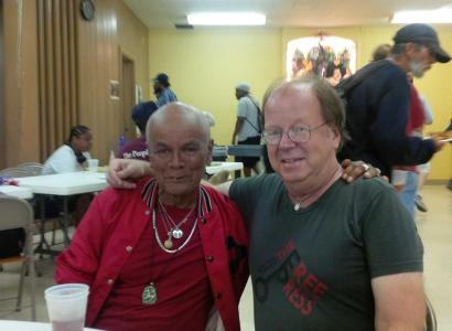 Two men sitting at a table 