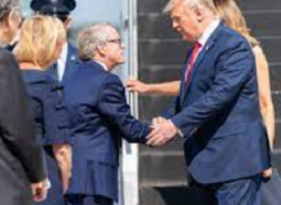 Dewine shaking hands with Trump