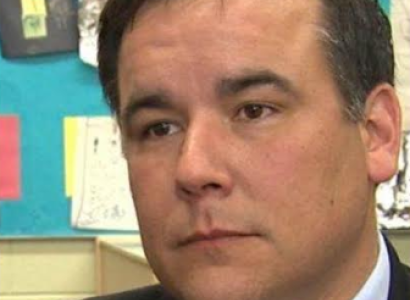 Middle aged white ma's face looking vacant