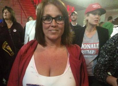 Woman wearing Trump can grab my...