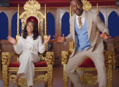 Black preacher and wife in big thrones