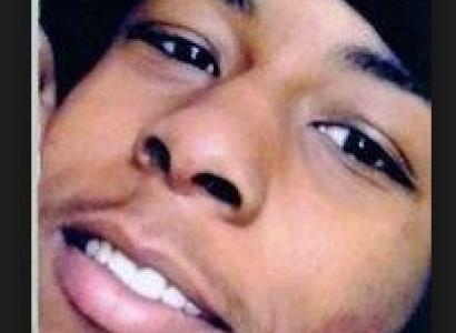 Young black man closeup of his face smiling