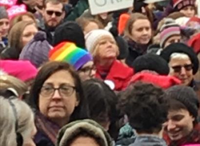 A crowd of mostly women and a sign reading Pissed Off Grandma!