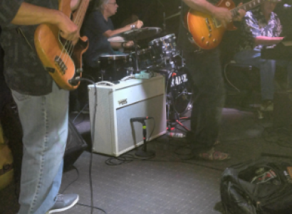 Guys playing instruments