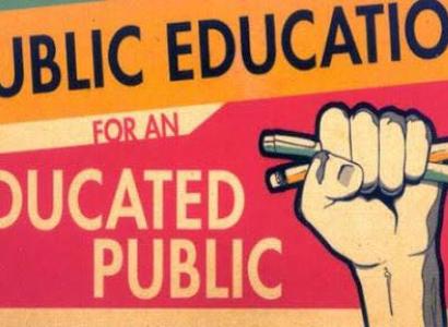 A fist with pencils in it and the words Public Education for an Educated Public
