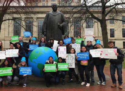 SDD demonstrators next to the Columbus statue at City Hall