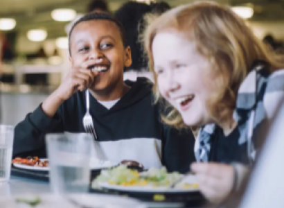Children at table eating lunch