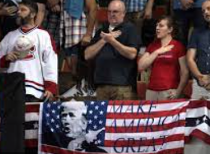 Protestors with MAGA flag