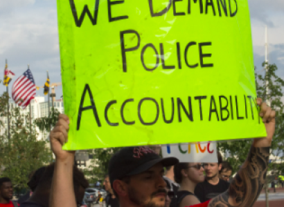 Sign saying We Demand Police Accountability