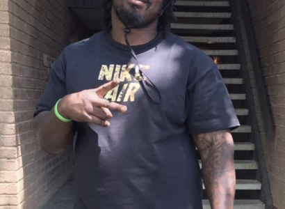 Man making peace sign