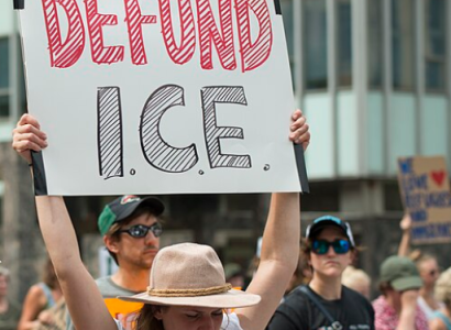 Defund ICE protest sign
