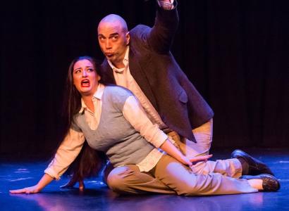 Man and woman on the floor taking a selfie