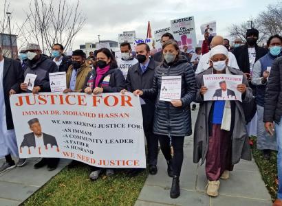 People marching with banner