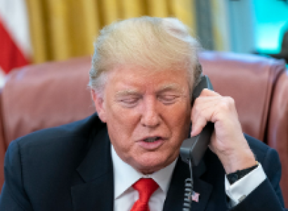 Trump at his desk on the phone