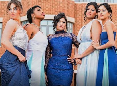 Women posing in gowns