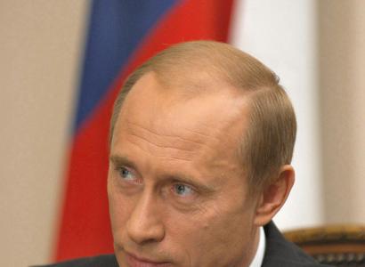 Putin's face, white guy with balding brown hair and a suit
