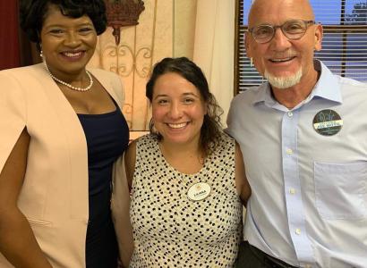 Three people, a black woman, a Latina woman and white man