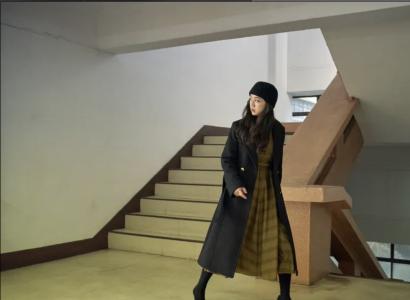 Woman walking and looking behind her