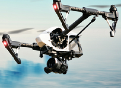 Drone flying in the sky, three propellers